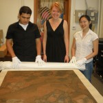 2008 Summer Getty and Wilson interns assisting with conservation of a Chinese painting: Rody Lopez (Pomona ’09); Zoe Larkins (Scripps ’09); Patricia Yu (Pomona ’09).