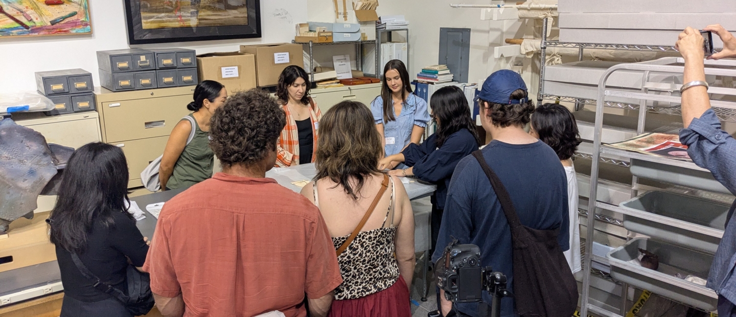 Interns and staff standing around conservation project.